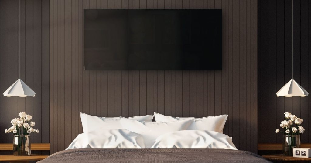 Herschel Inspire black glass infrared panel above bed