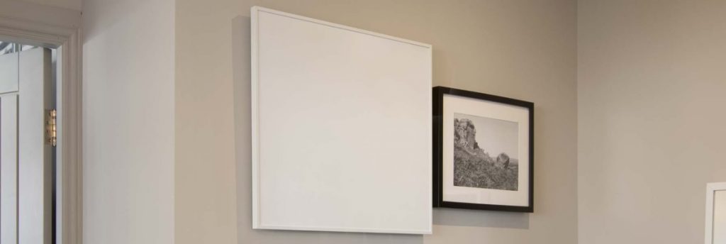 Ecostrad Accent IR white infrared heating panel on wall